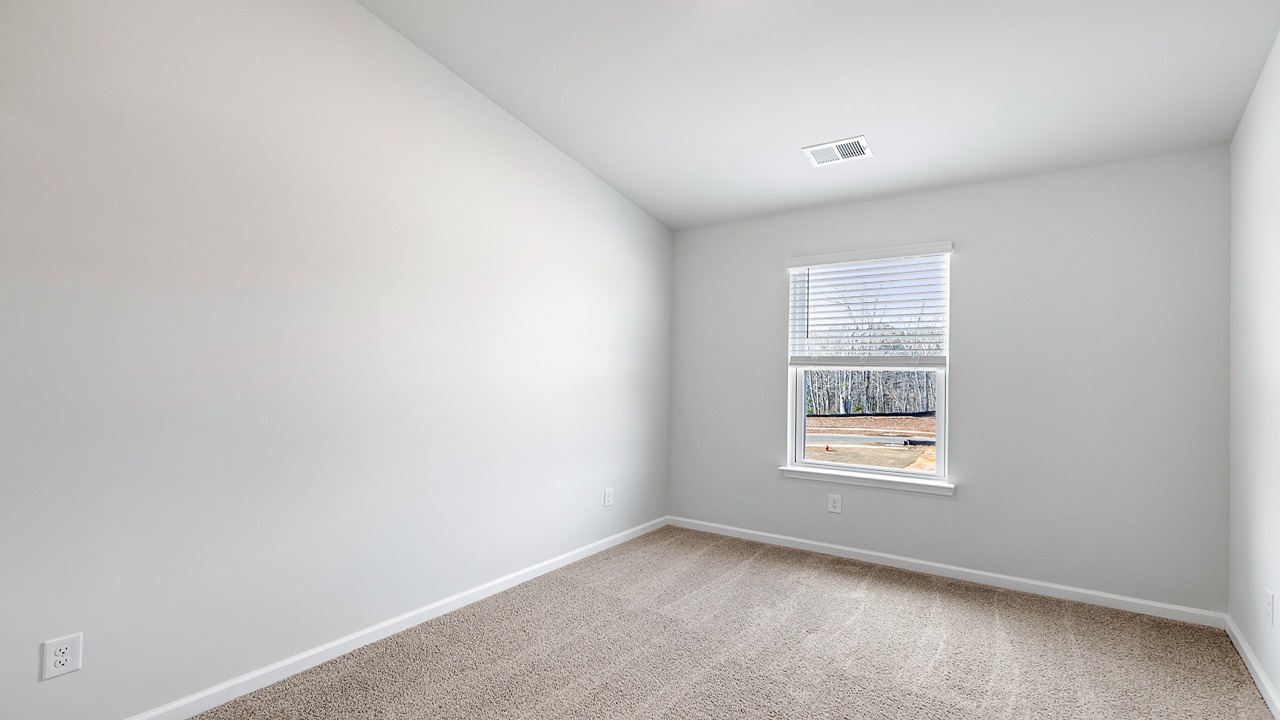 Guest bedroom with windows
