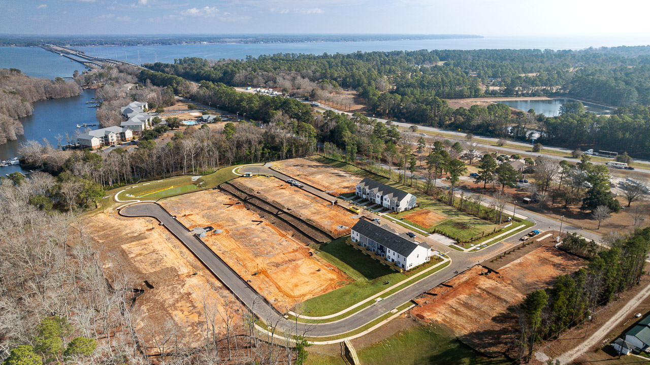 Aerial of a lakefront townhome community