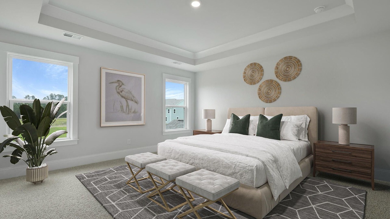 primary bedroom with king sized bed