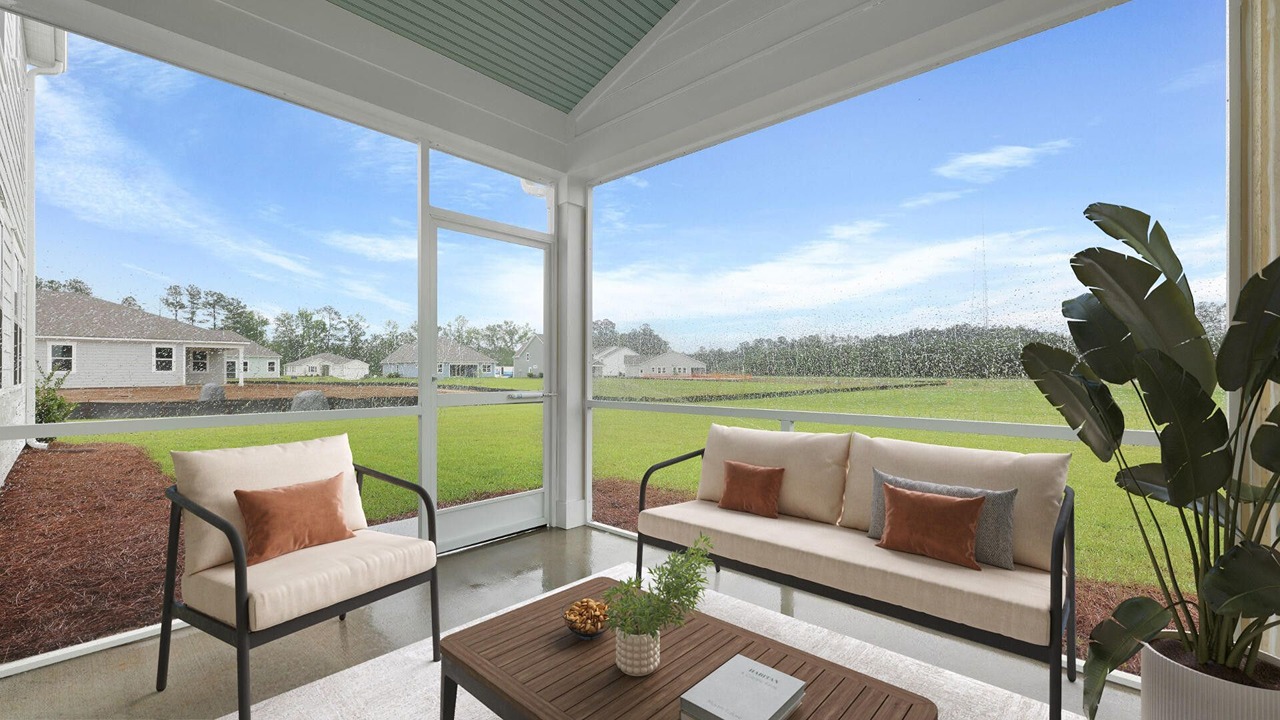 Spacious back porch leads to a large backyard