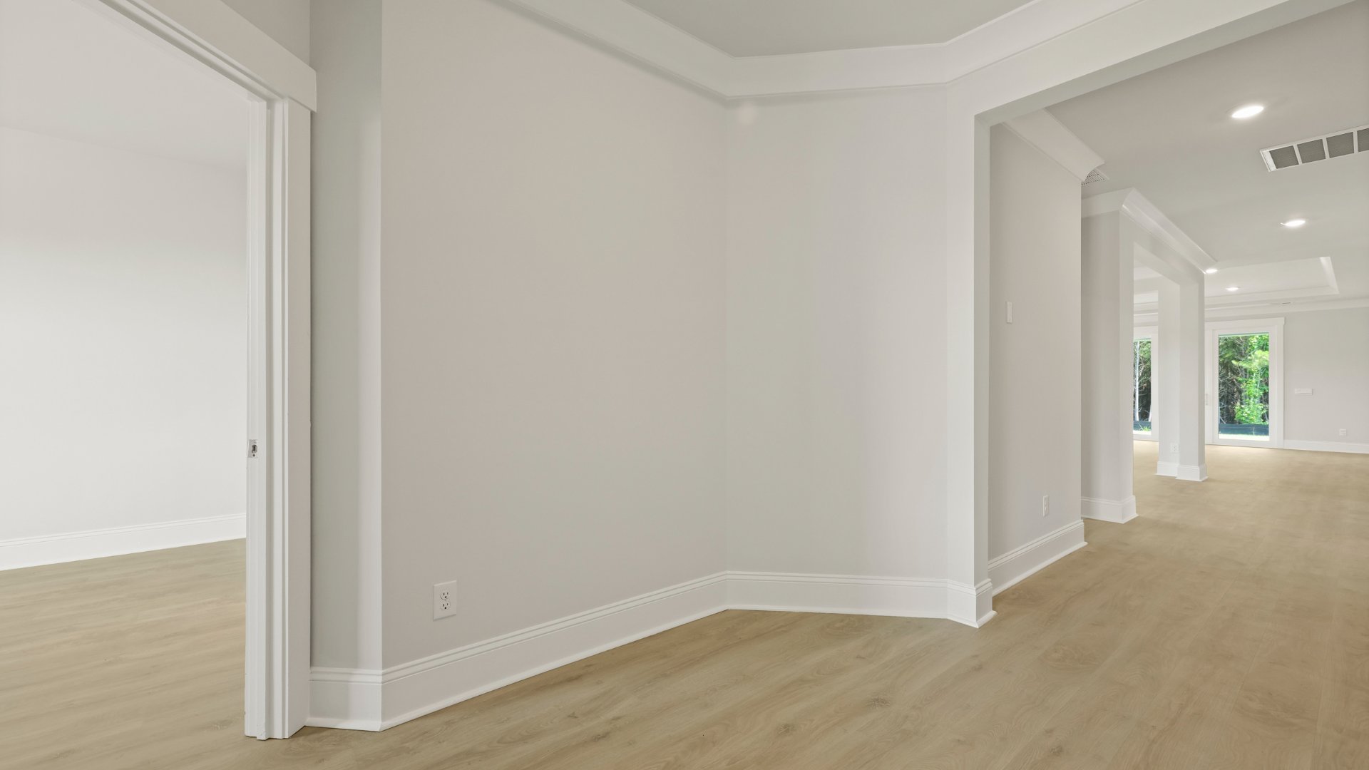 Bedroom 3 is down the hall from the dining room.