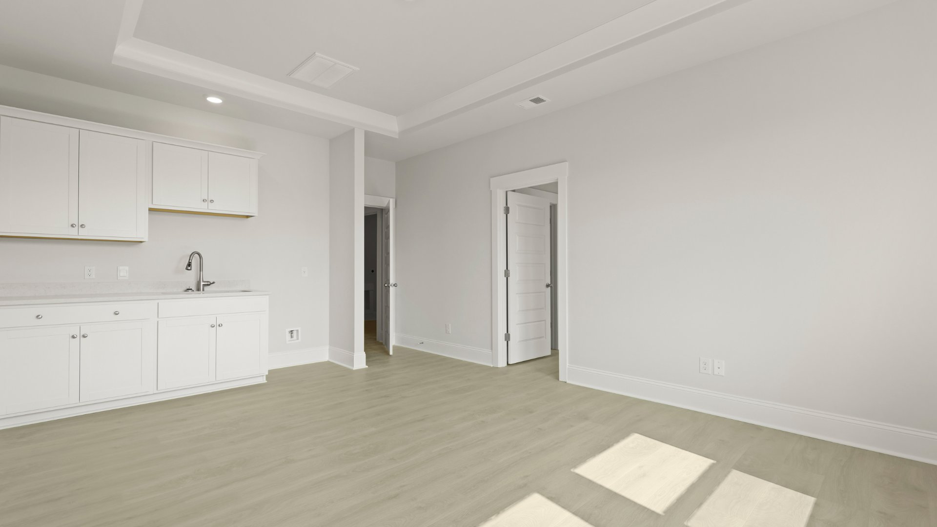 The multi-gen suit has a bathroom in the room and a kitchenete.