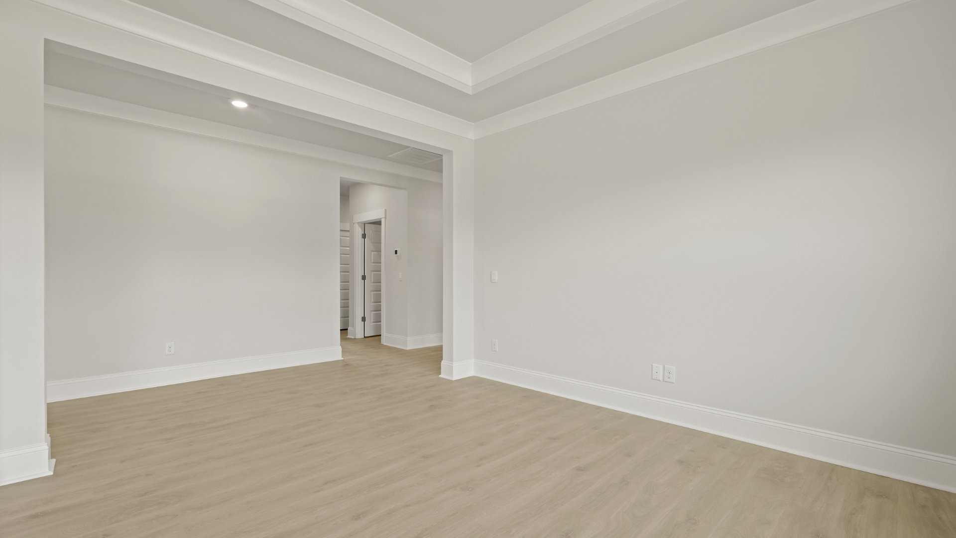 The spacious dining room allows for entertainment and hosting.