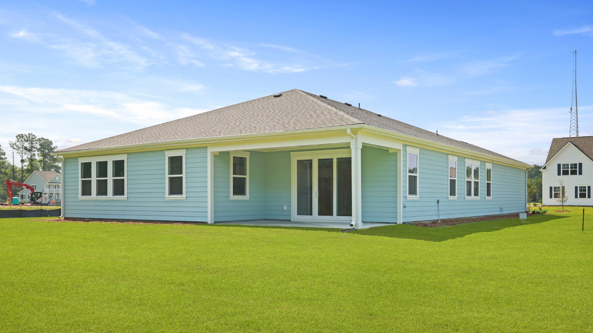 The rear exterior of the Camden floorplan located in Berkeley Bay, in Ridgeville, South Carolina.