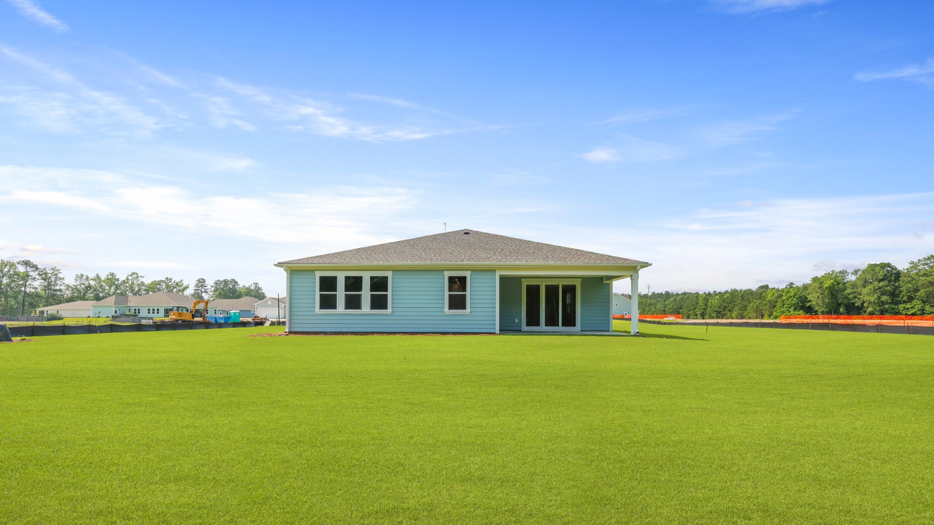 The rear exterior of the Camden floorplan located in Berkeley Bay, in Ridgeville, South Carolina.