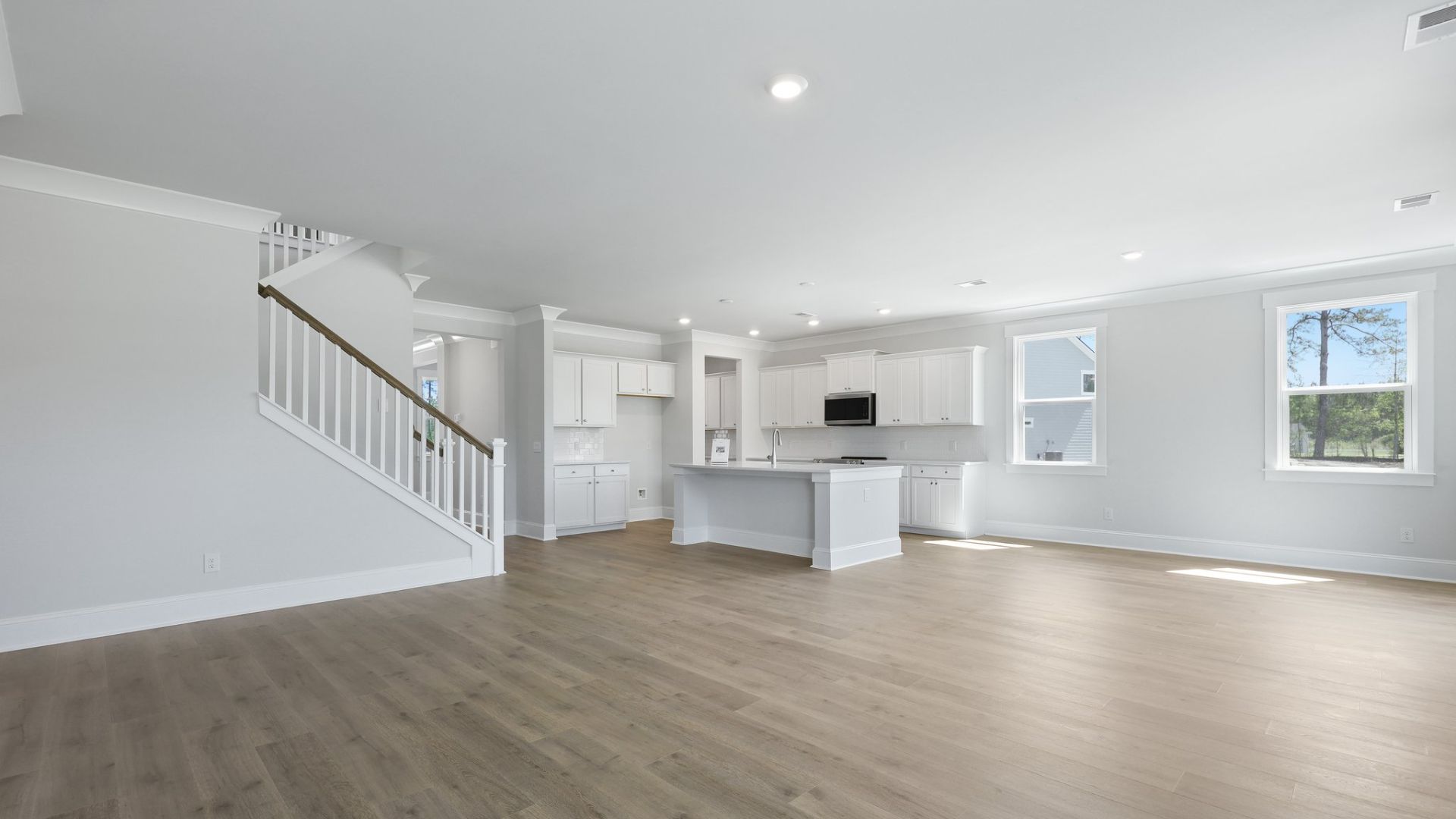 The living room is spacious and open concept.