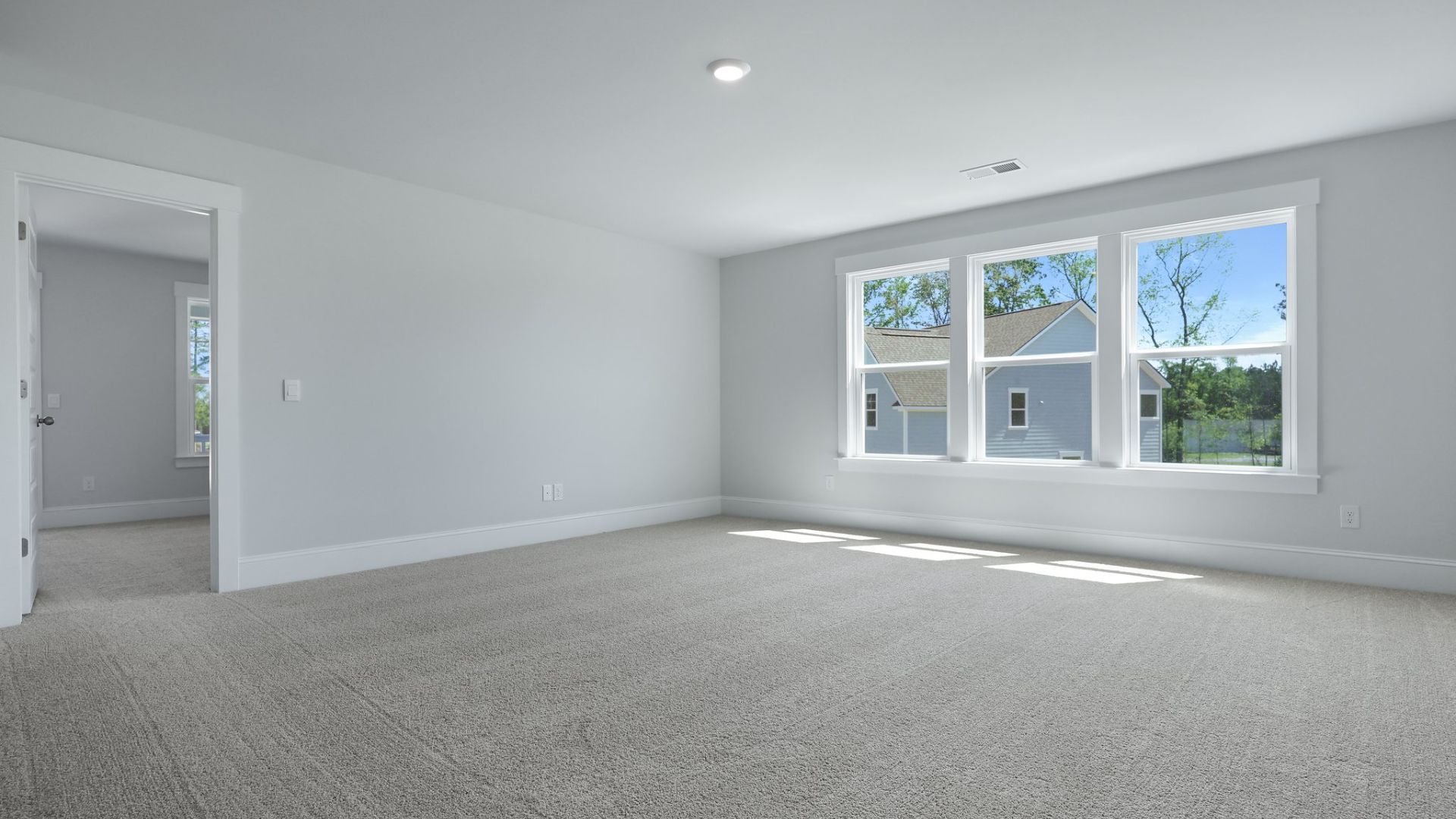 The loft is carpeted and located upstairs.