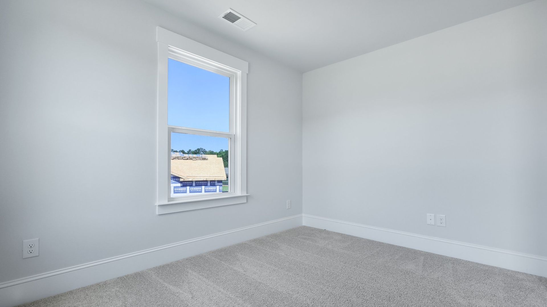 The sitting room is located in the primary bedroom.