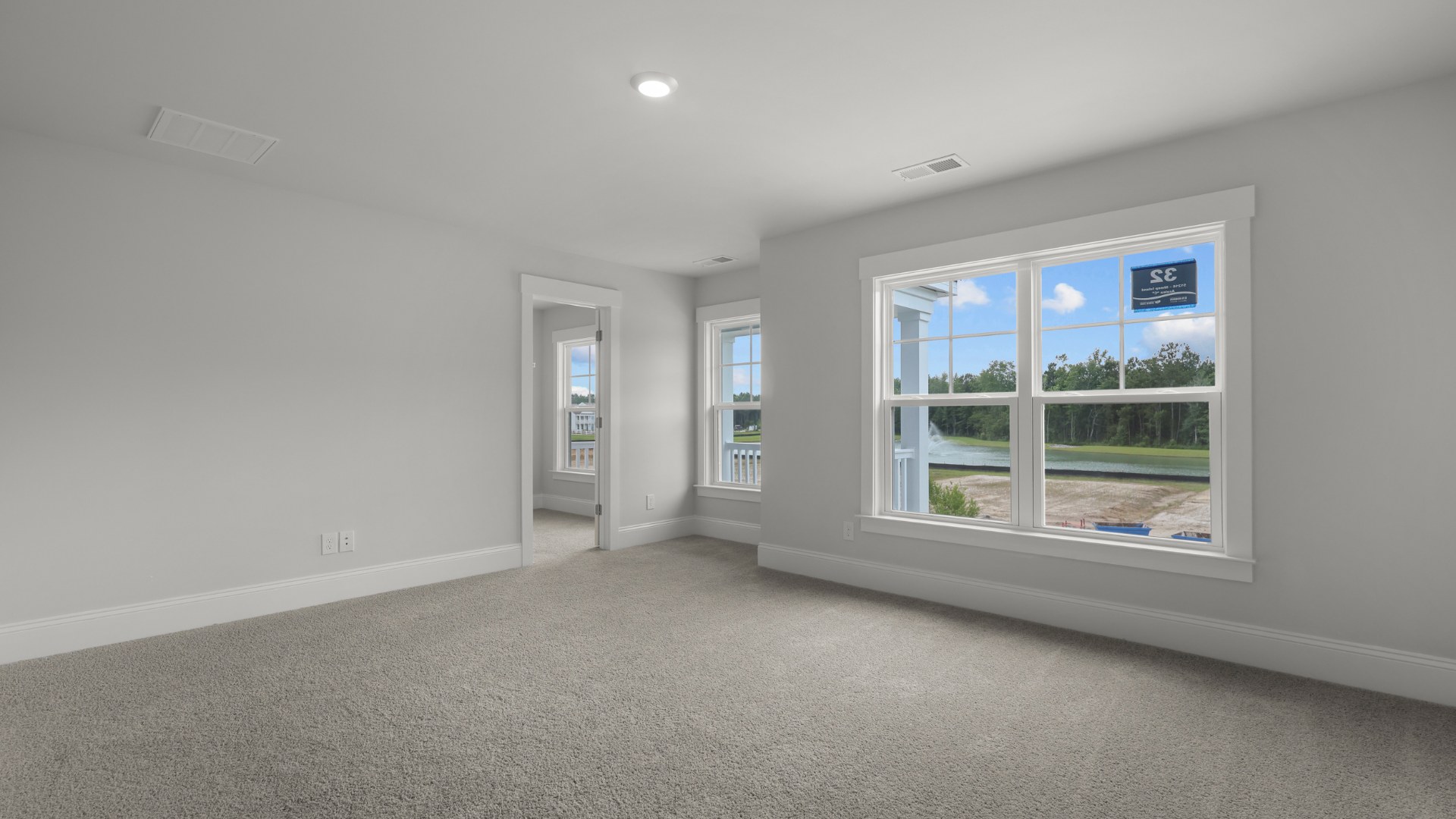 primary bedroom with natural light