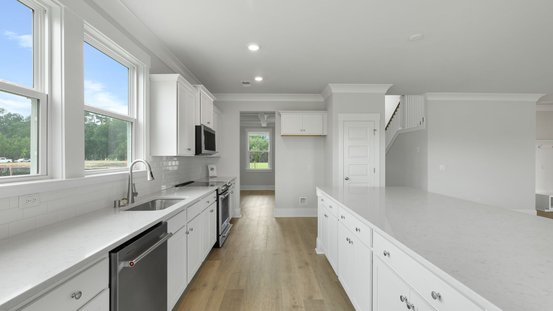 large kitchen with quartz