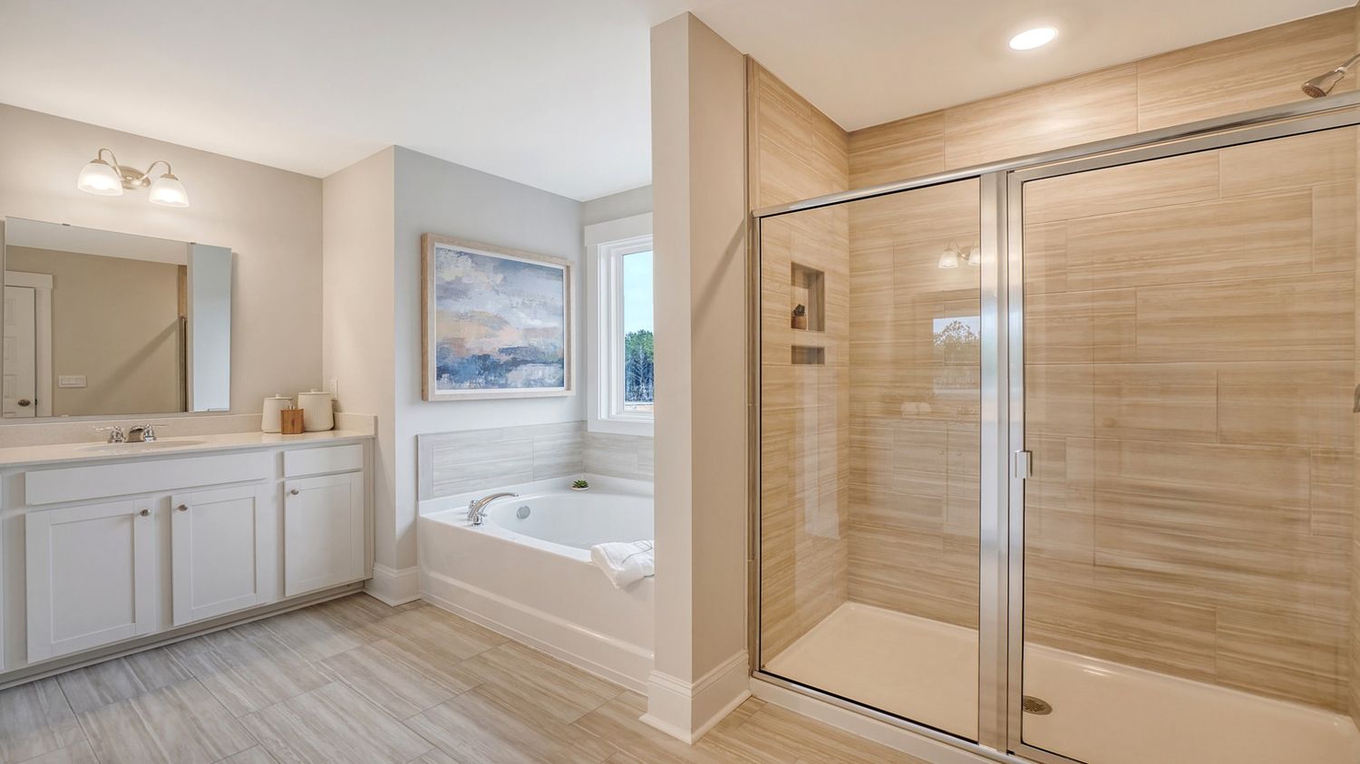 primary bathroom with walk in shower