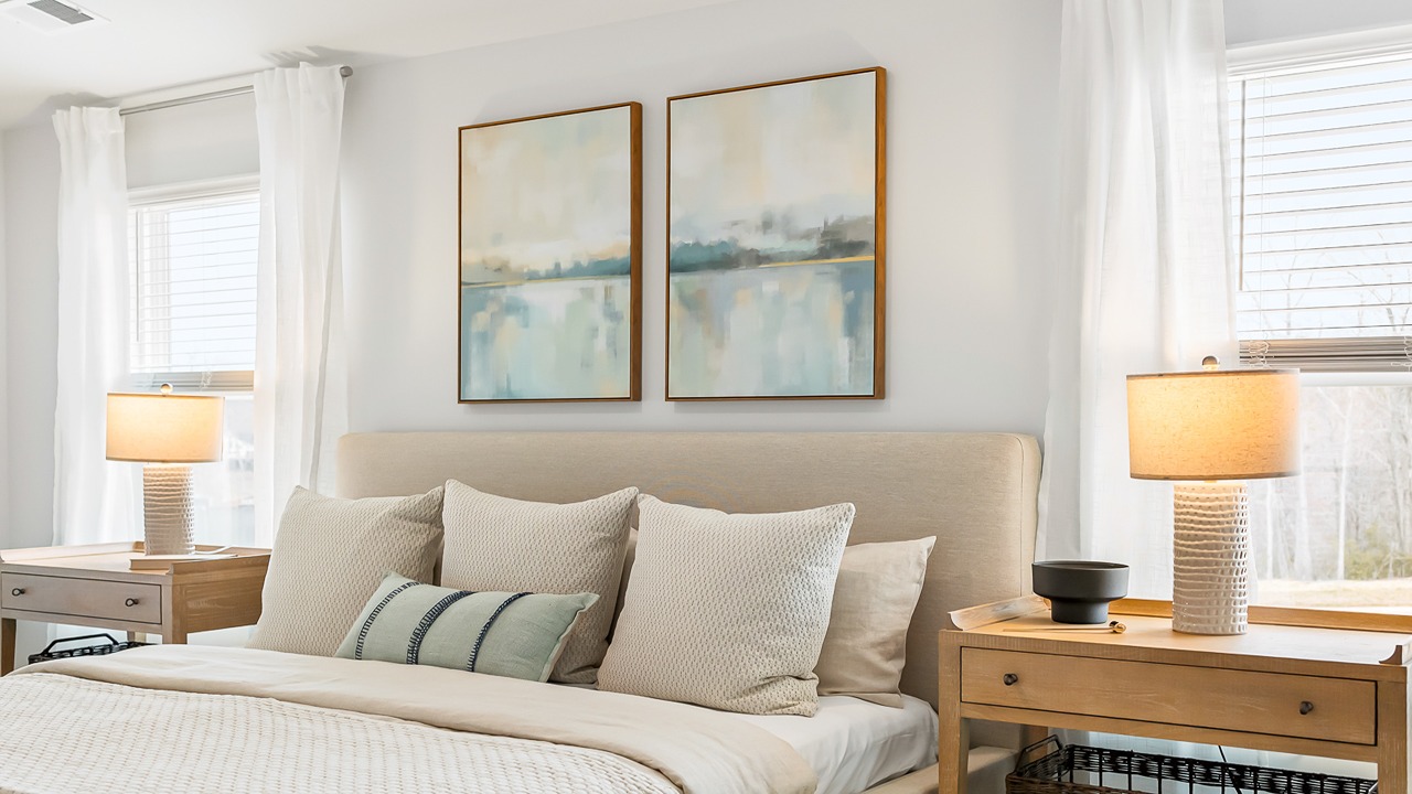 Primary bedroom with vaulted ceilings
