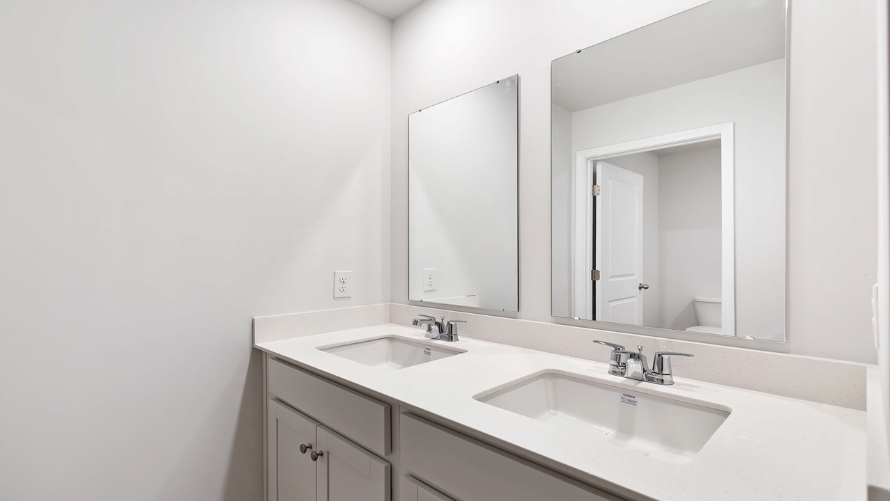 Guest bathrooms with double vanities