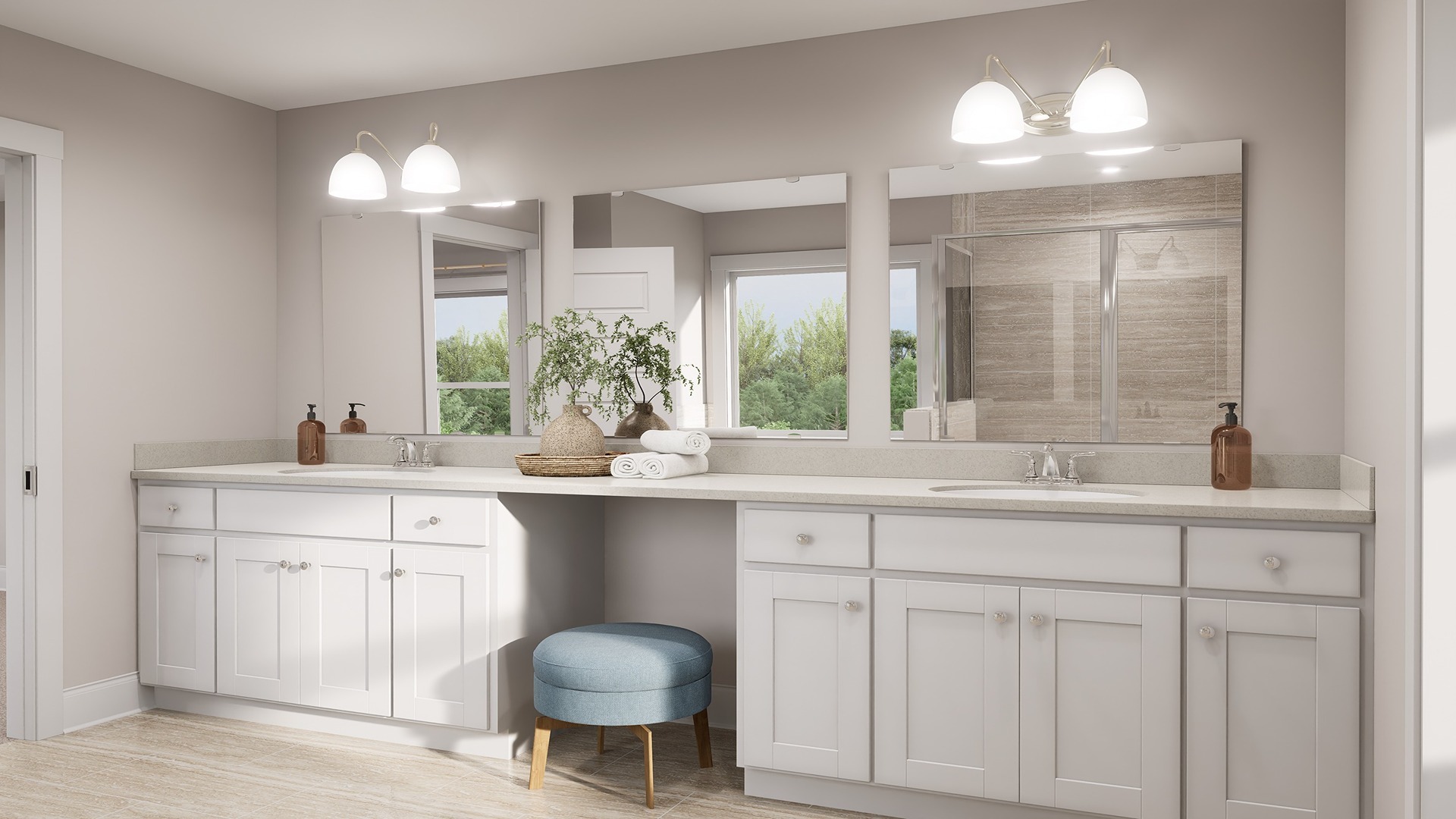 Dual vanities in the primary ensuite bathroom.