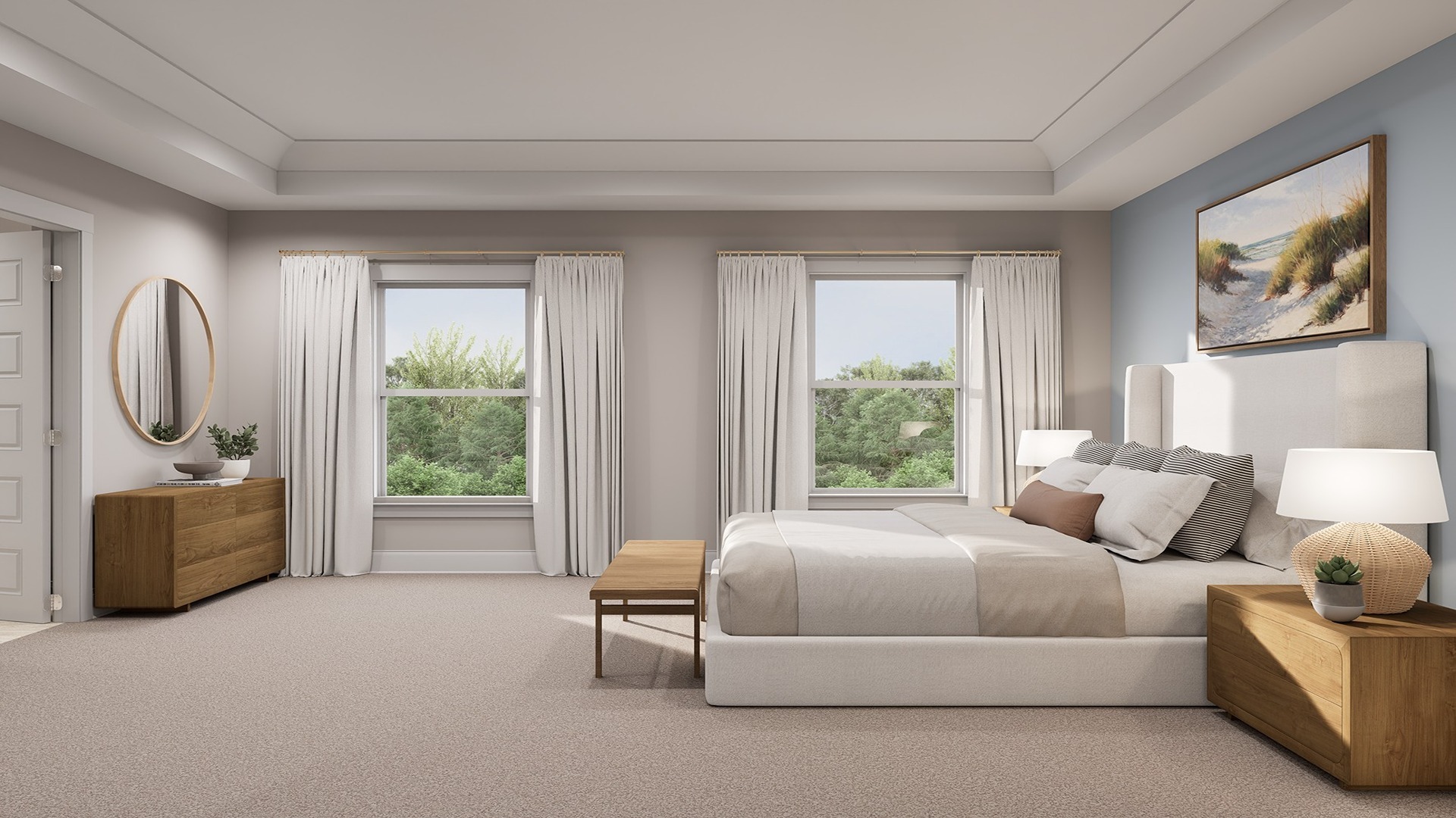 Multiple windows bringing natural light into the primary bedroom.