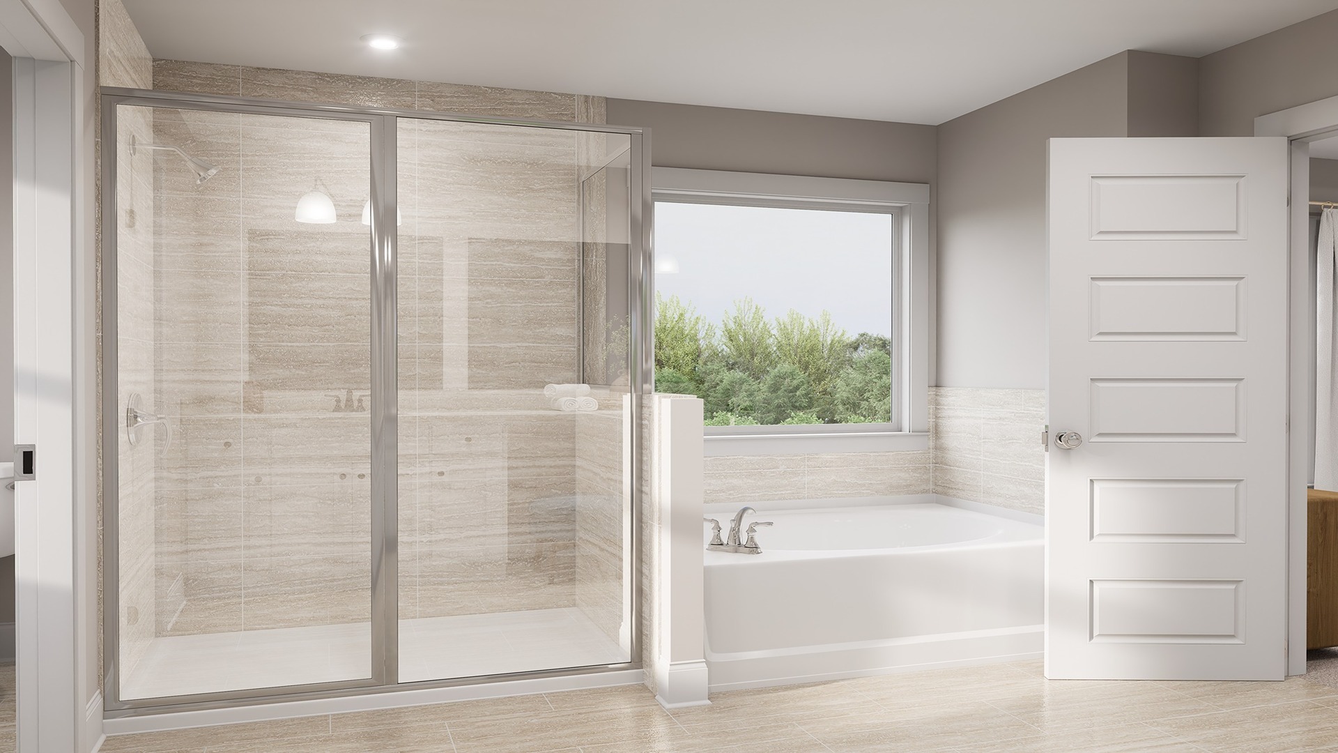 Standup walk-in shower and bathtub in the primary bathroom.