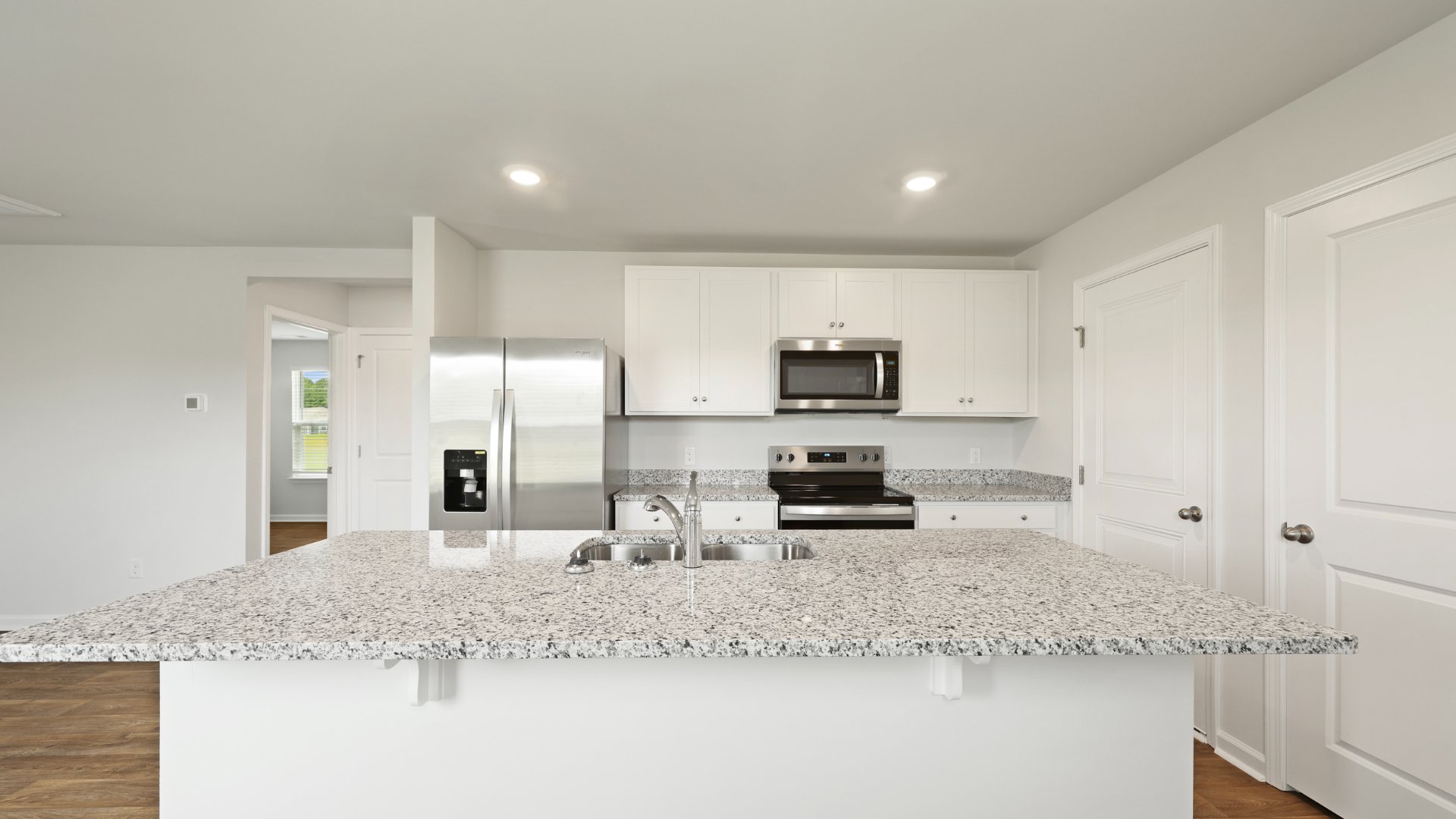 Kitchen with white cabinets