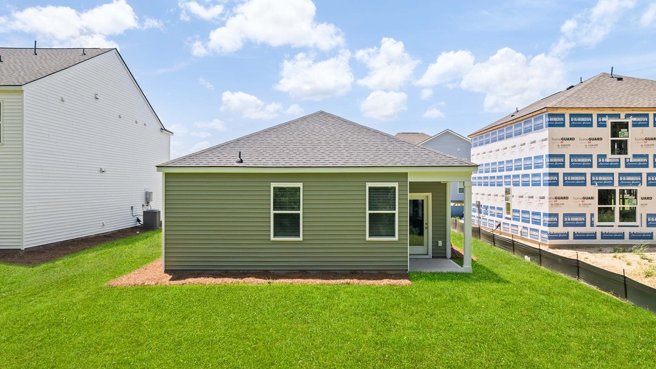 rear of single story home in carolina groves