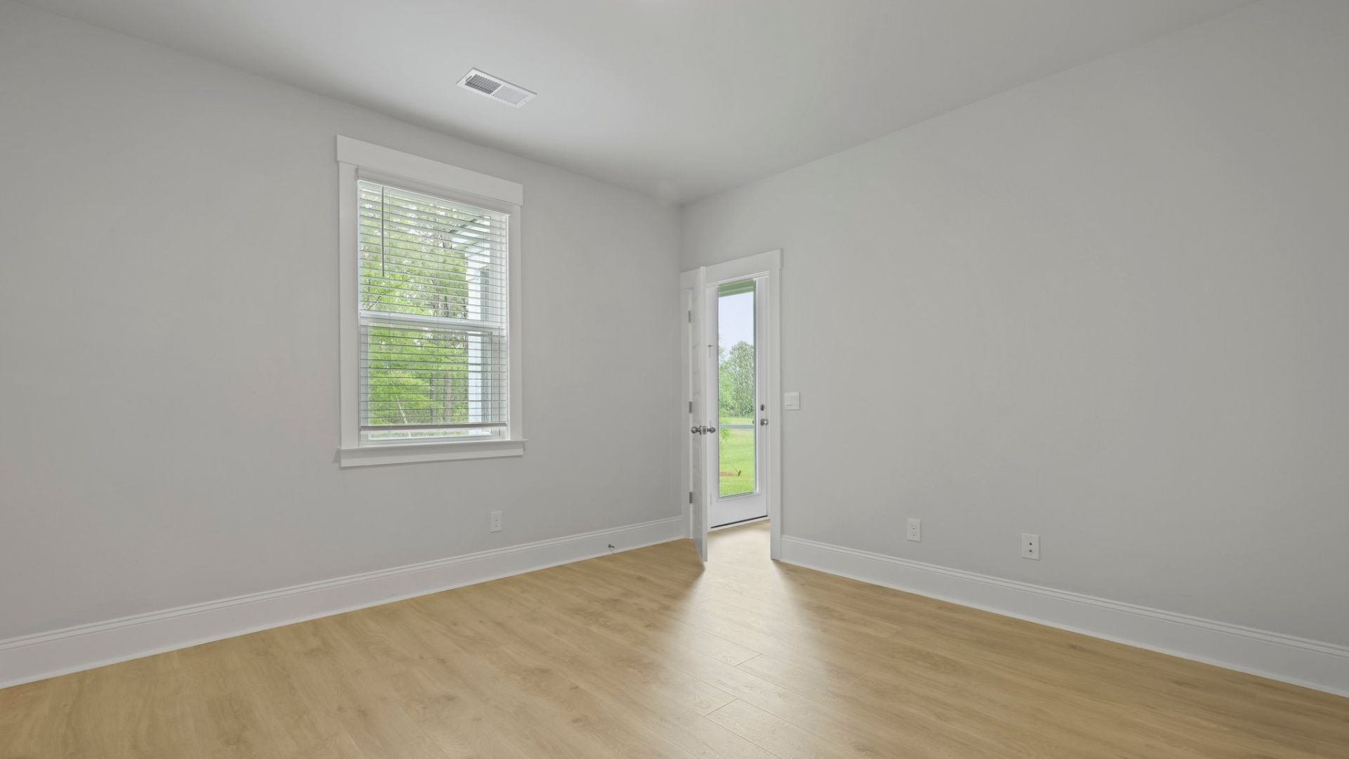 primary bedroom with natural lighr