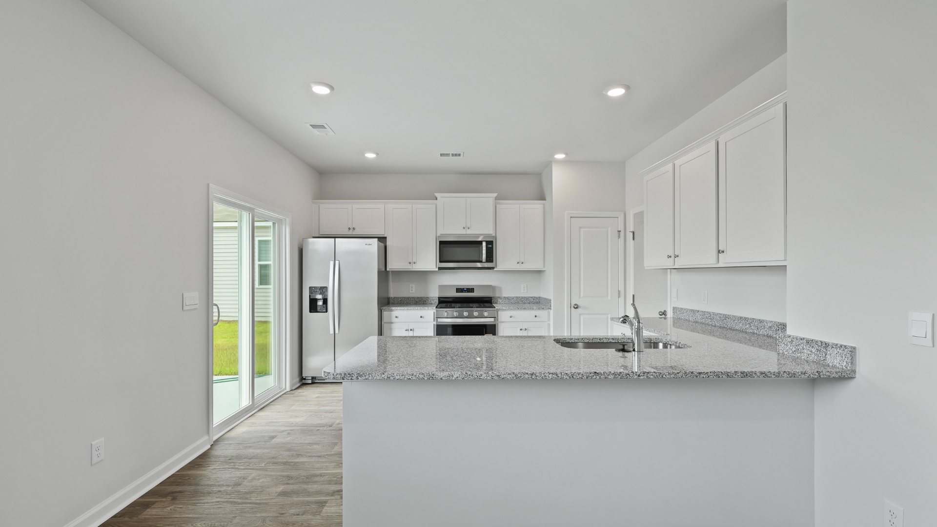 Kitchen with large sliding doors
