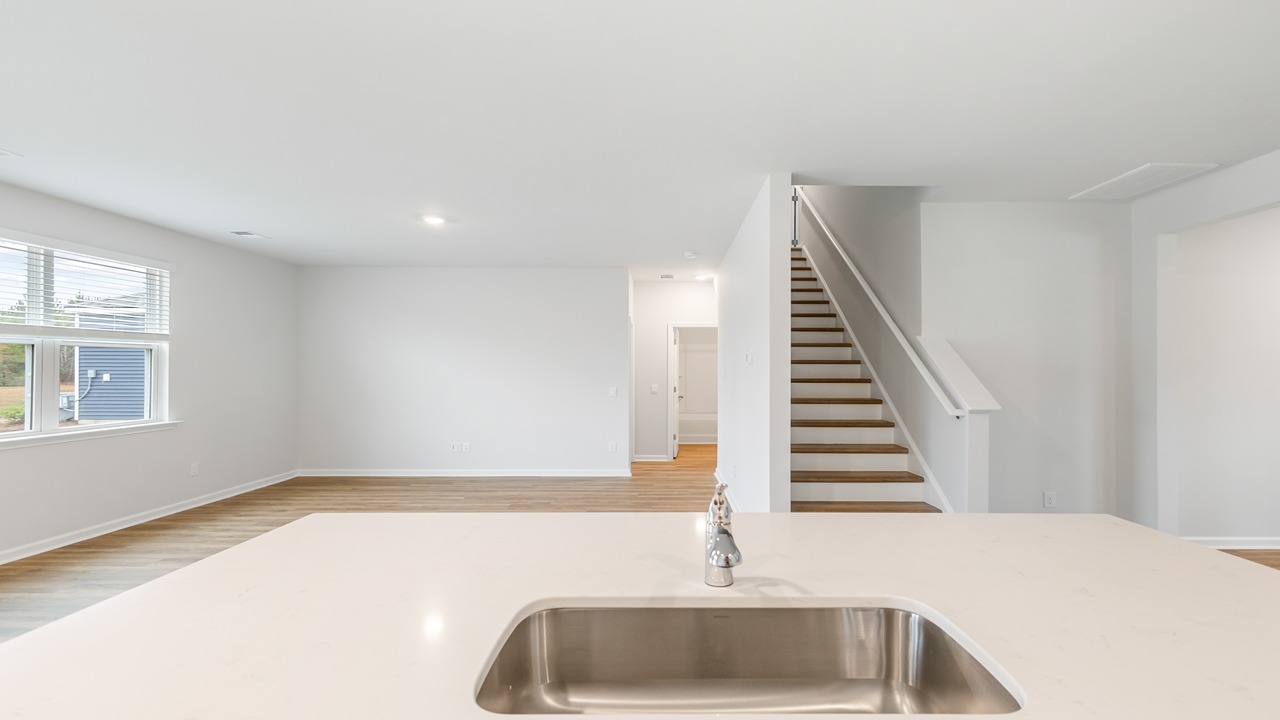 Center kitchen island overlooking the stairwell
