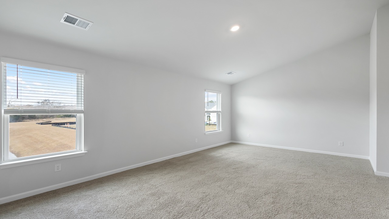 spacious primary bedroom