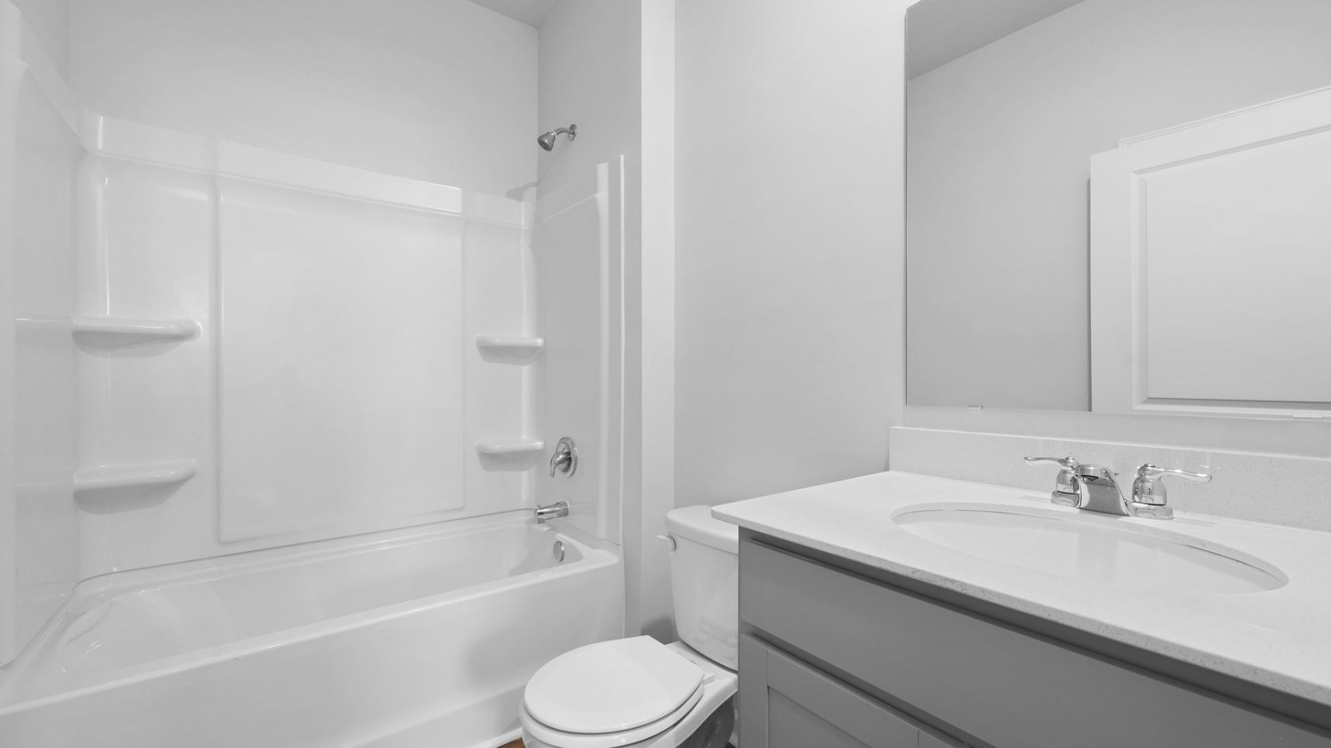 Bathroom 2 has a tub-shower combo.