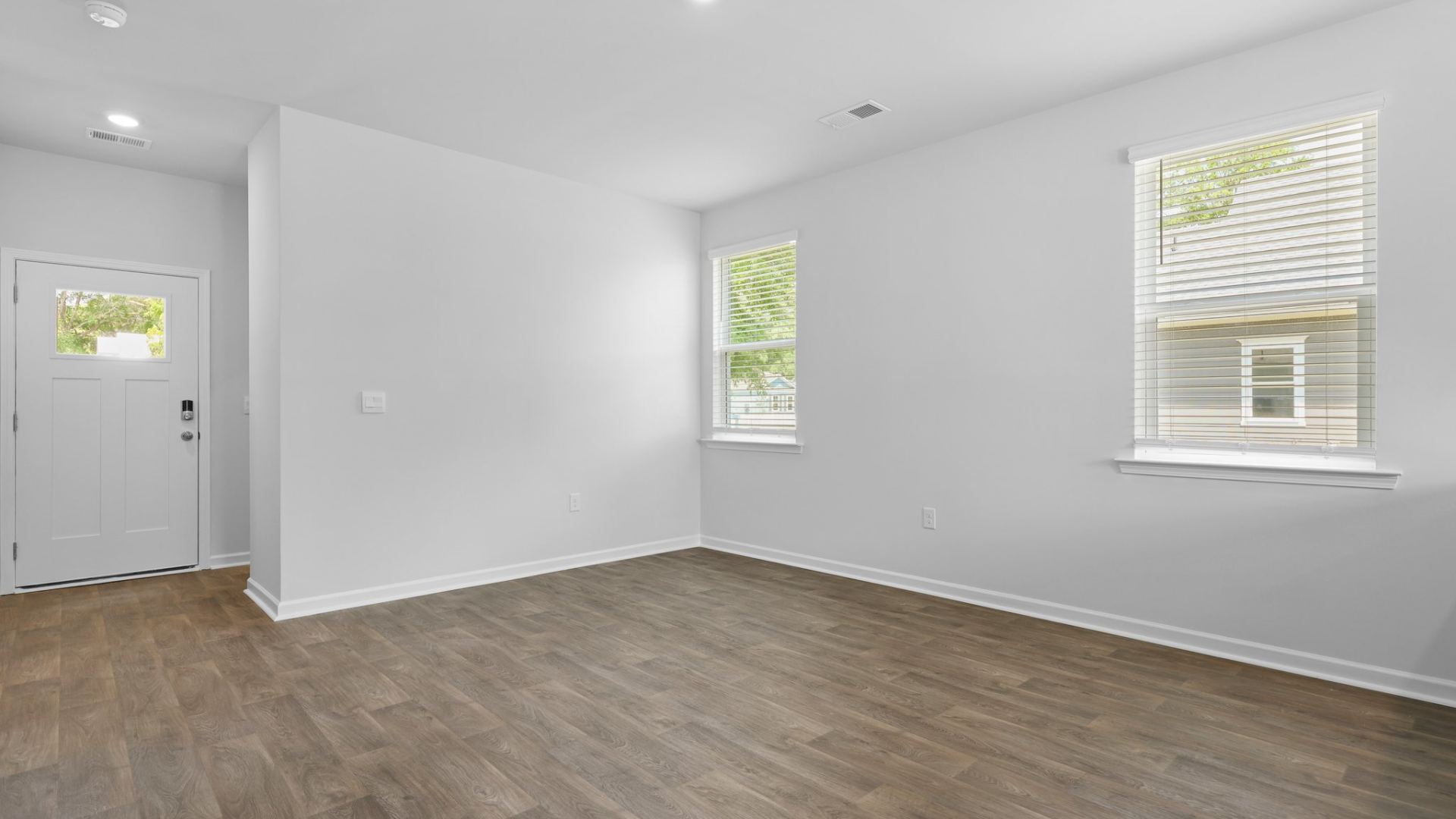 Windows allow natural light to shine in and brighten up the space.