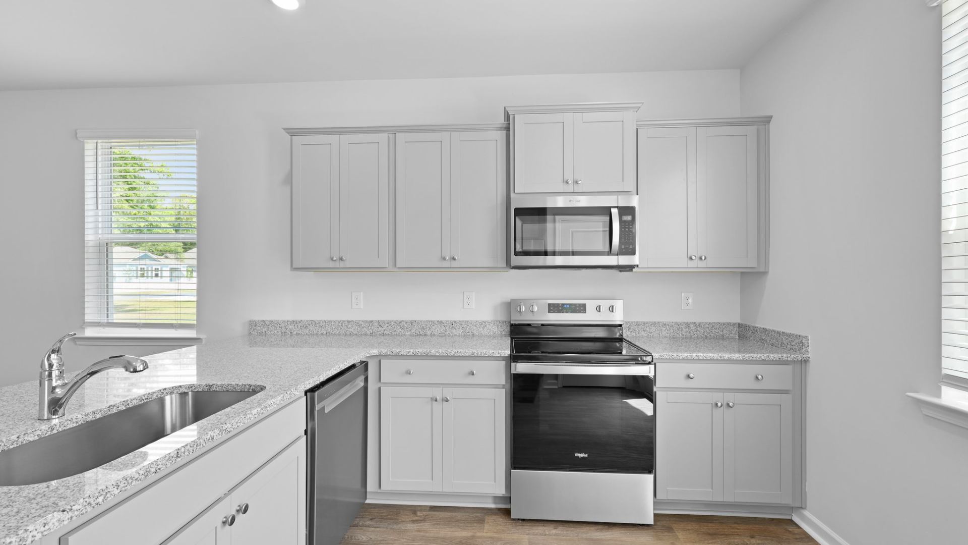 Stainless steel appliances featured in the kitchen.
