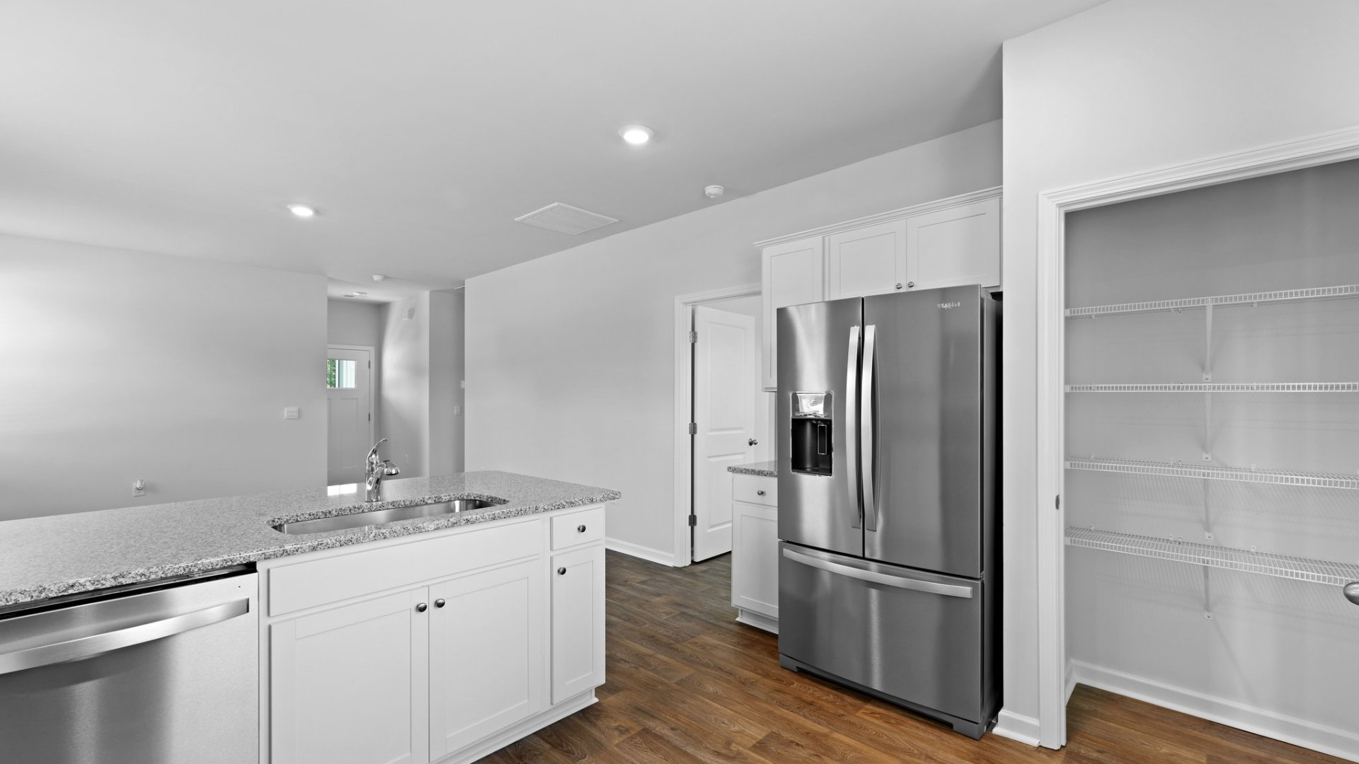 Spacious pantry in the kitchen as well as the kitchen overlooks the living room and dining room.