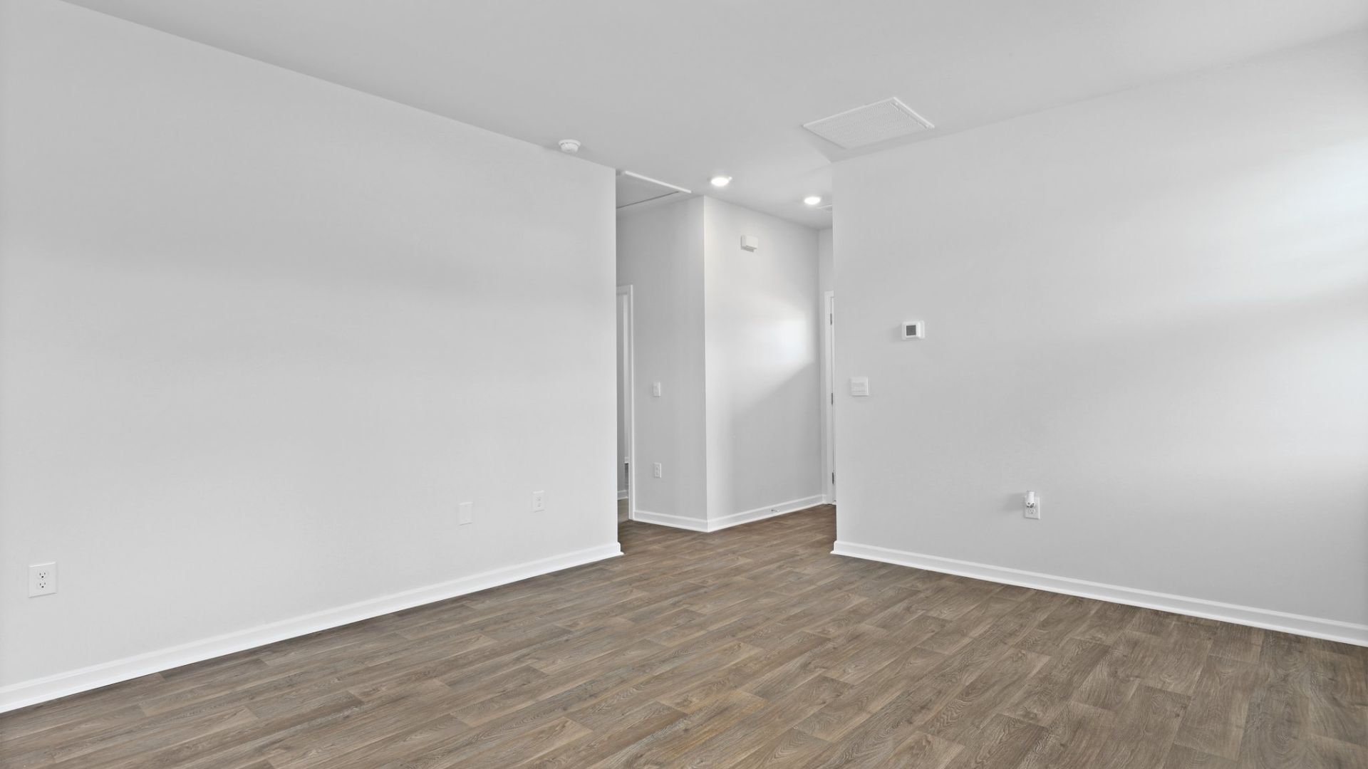 The entry way of the Perry leads to the open concept living areas.