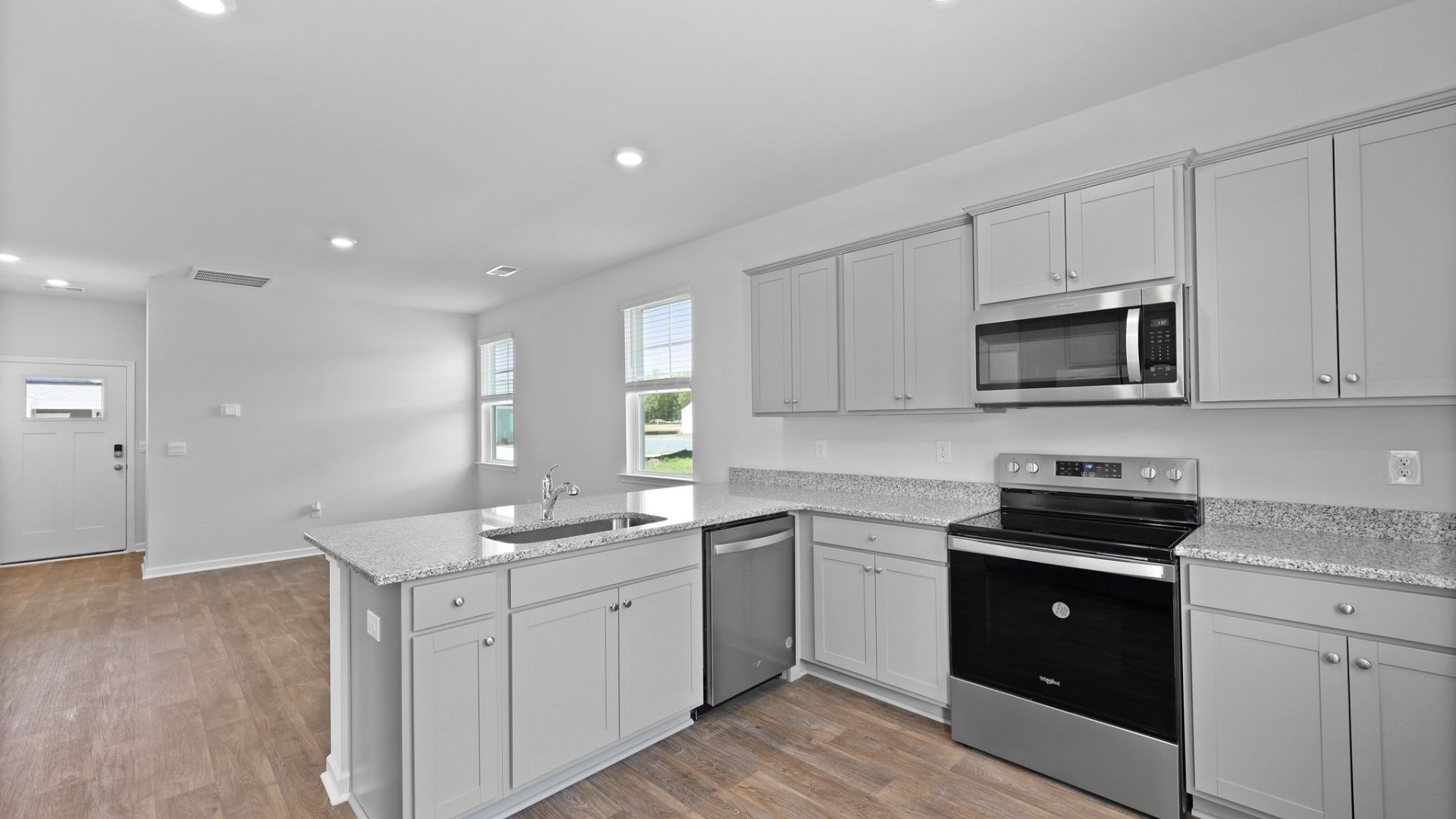 Stainless steel appliances featured in the kitchen.
