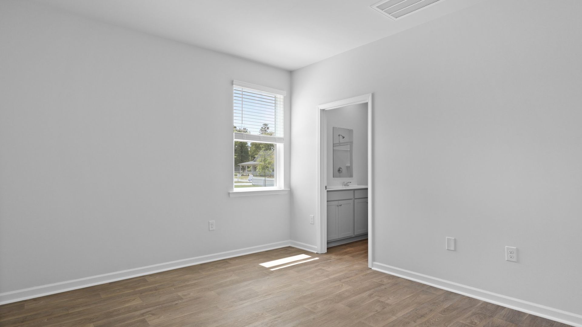 The primary bathroom is located in the primary bedroom for comfort and convivence.