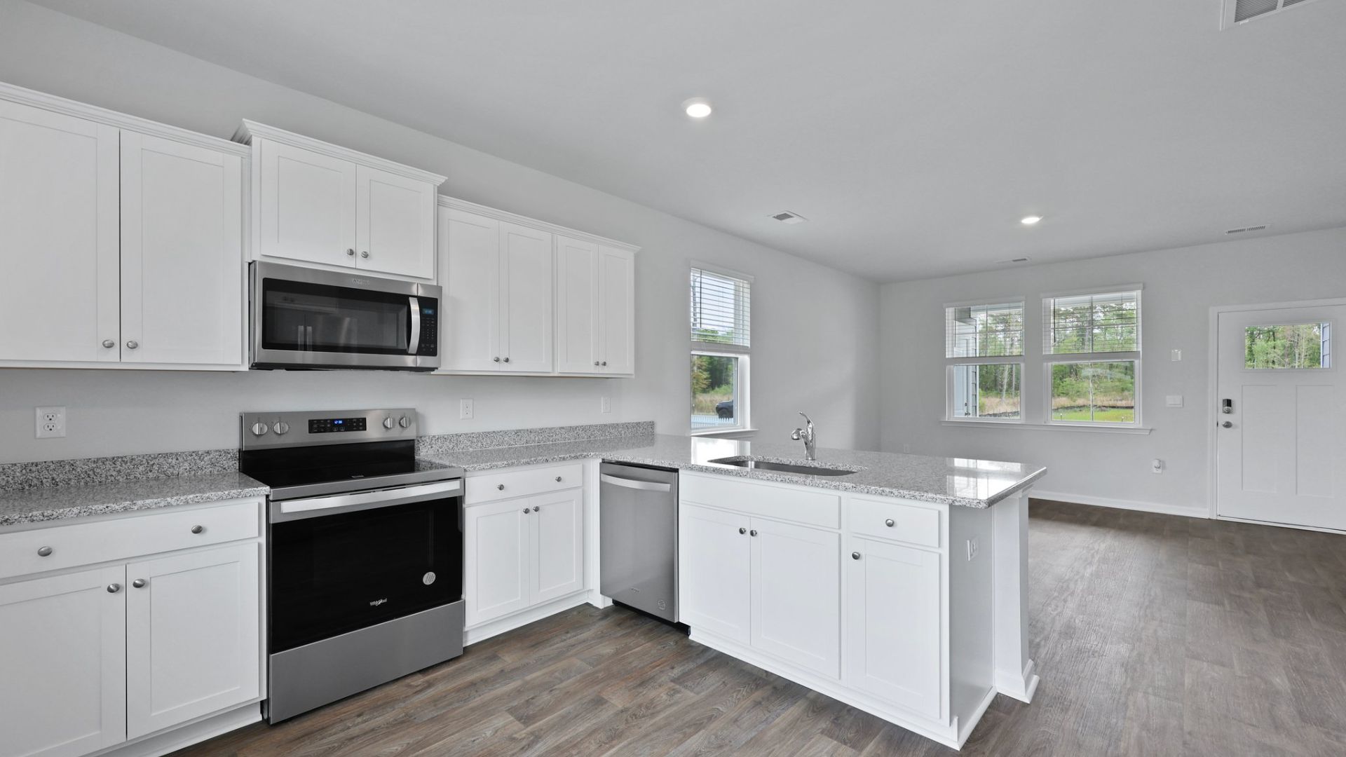 Stainless steel appliances featured in the kitchen.
