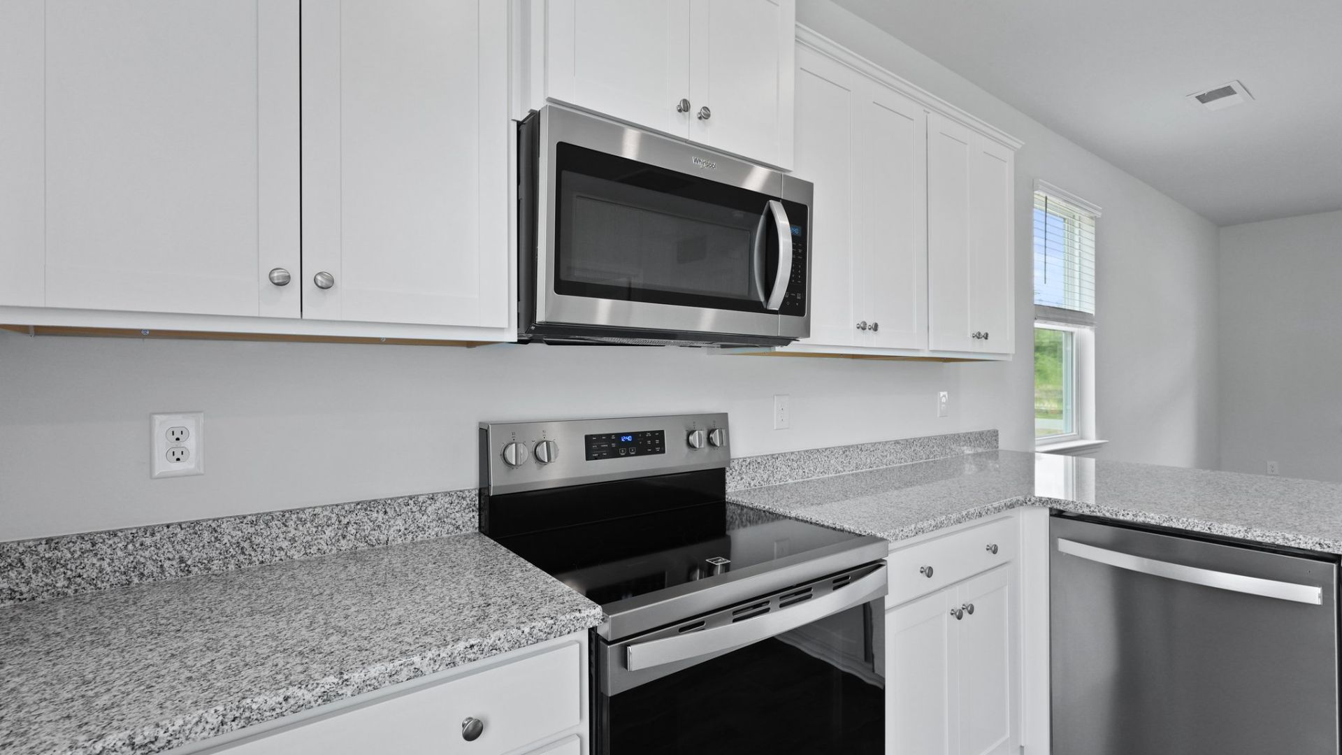 Stainless steel appliances featured in the kitchen.