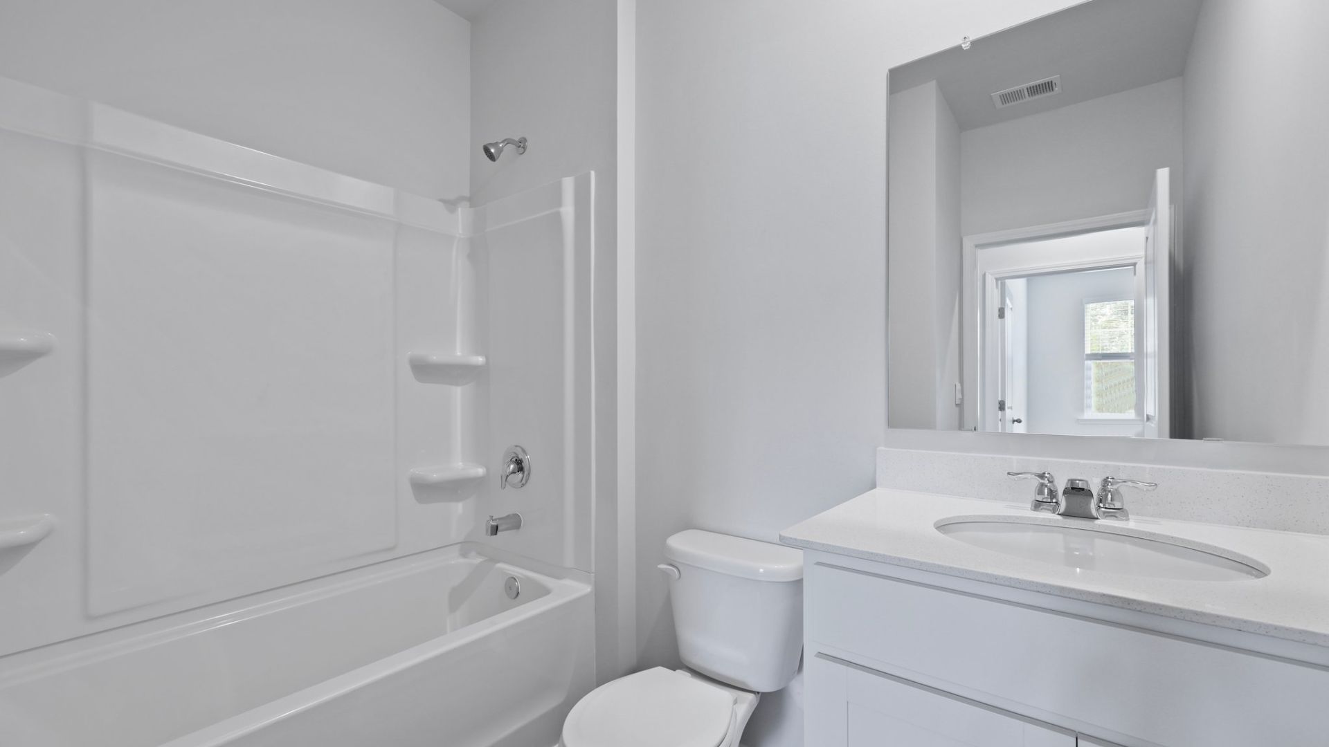 Bathroom 2 has a tub-shower combo.