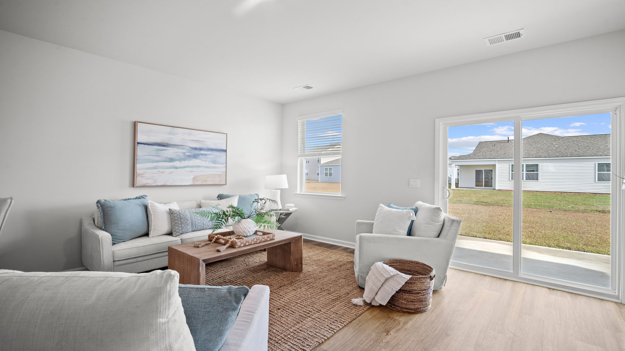 Living area of home decorated with seating