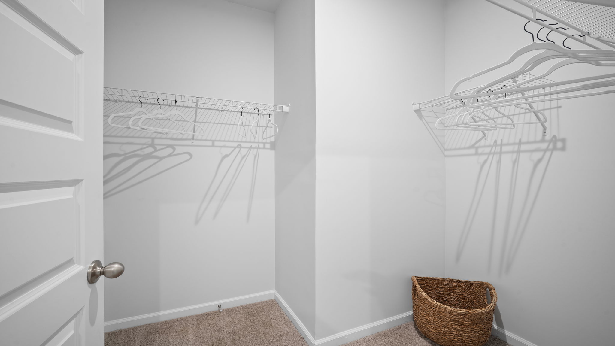 Large walk-in closet in the Greenbriar primary suite providing ample storage and organization solutions.