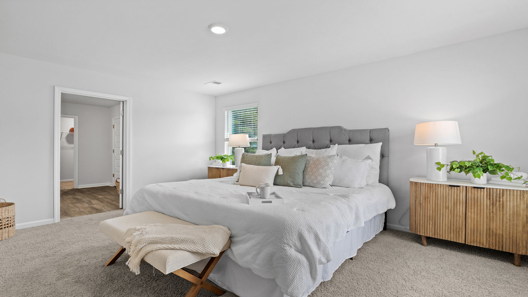 Owner's suite in the Downing floor plan offering comfort and privacy at the rear of the home