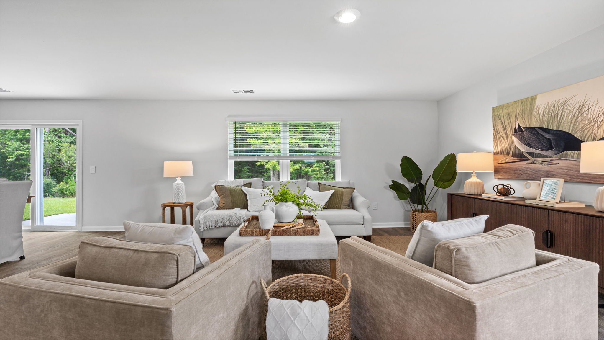 Open-concept living room in the D.R. Horton Downing floor plan with spacious entertaining area