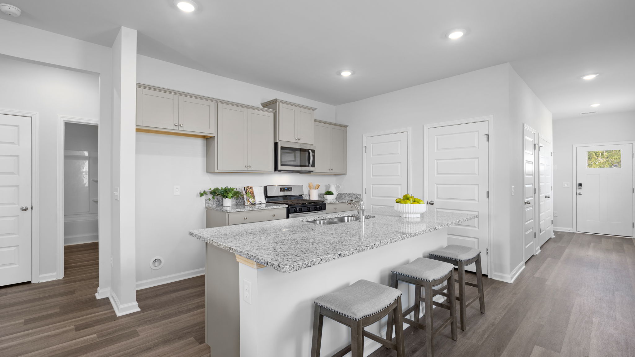 Downing kitchen island for casual dining in a D.R. Horton Ridgeland, SC home