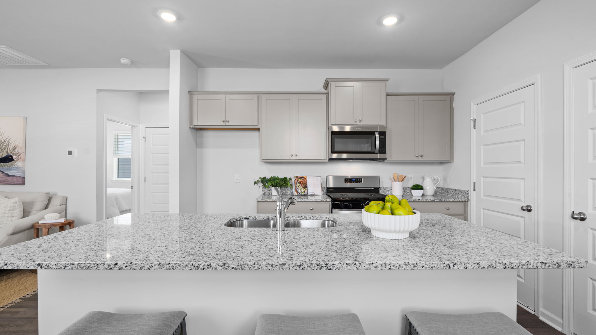 Large kitchen island in the Downing by D.R. Horton at The Retreat at East Argent