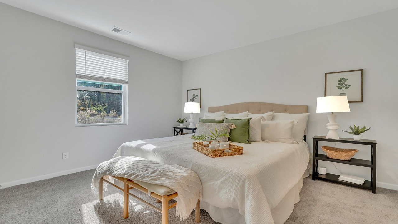 Private primary bedroom in the Helena floor plan at East Argent with spacious layout and natural light