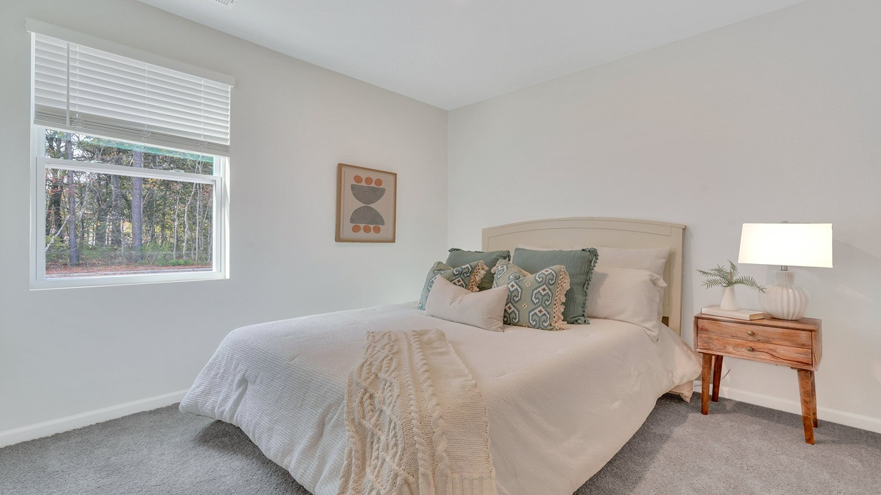 Bright guest retreat in the Helena floor plan with ample space and contemporary new home features
