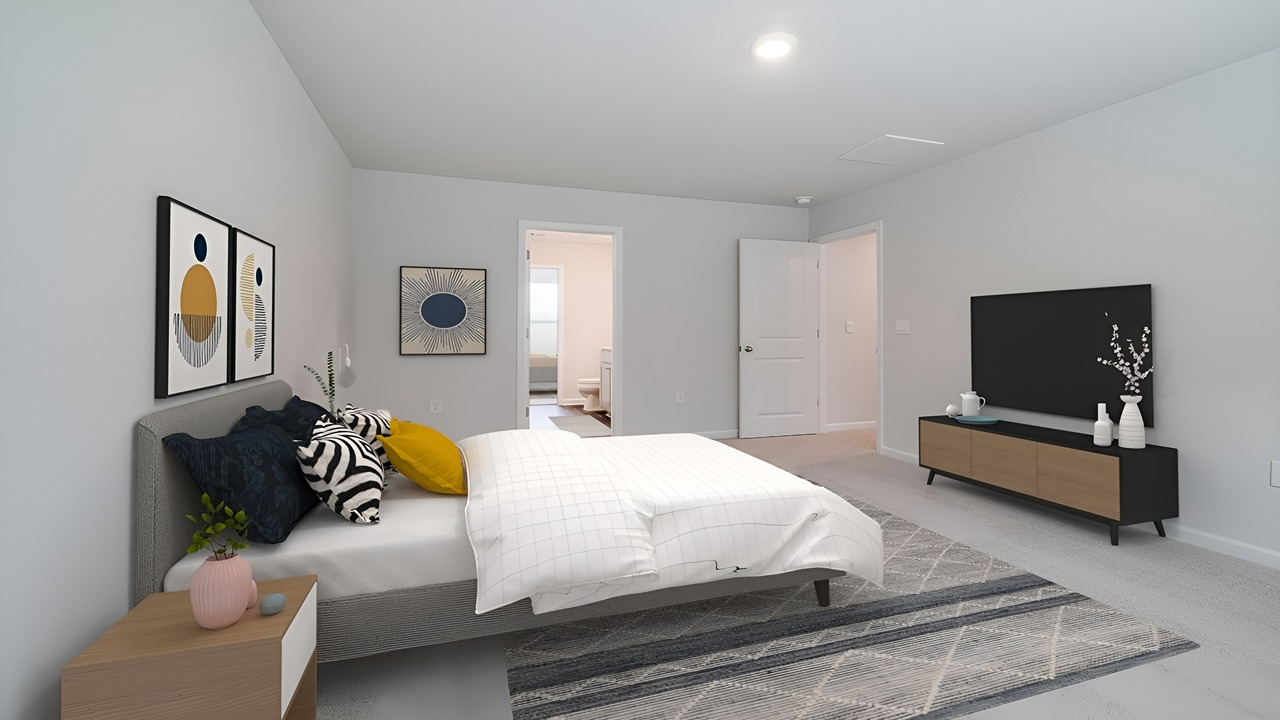 Primary bedroom with a bed, dresser and side table