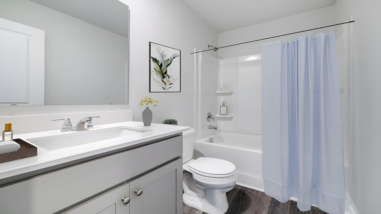 Secondary bathroom in the Brandon floor plan featuring modern fixtures, quality finishes, and convenient access from nearby bedrooms.