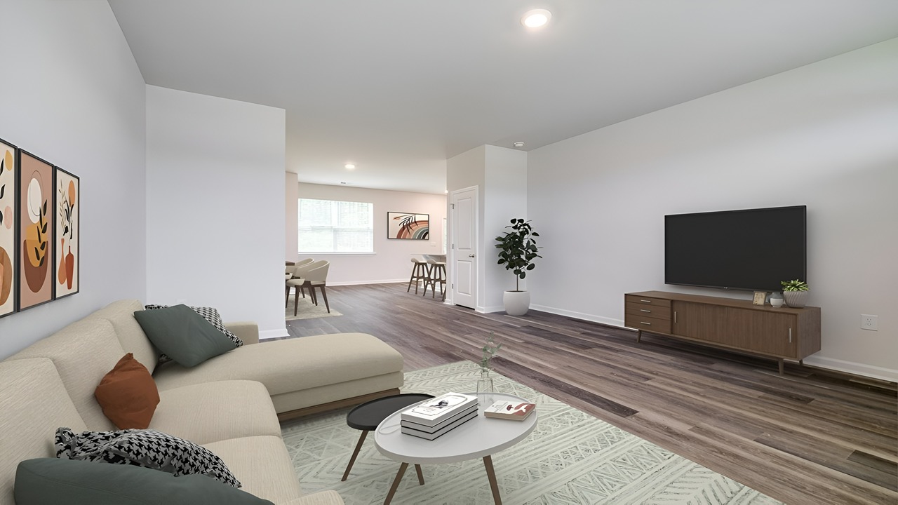 Bright family room designed for entertaining and everyday comfort with modern finishes and flexible living space.