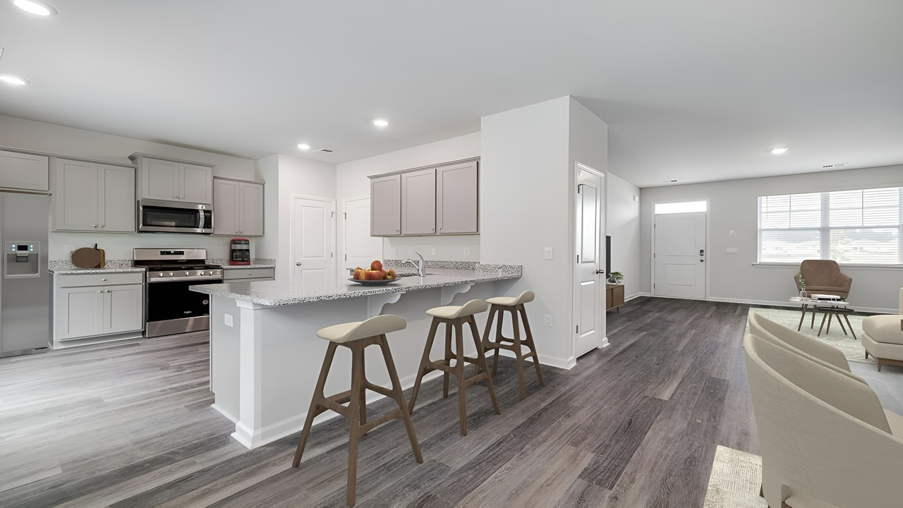 Dining area in the Brandon floor plan featuring an open layout, natural light, and seamless connection to the kitchen and living room.
