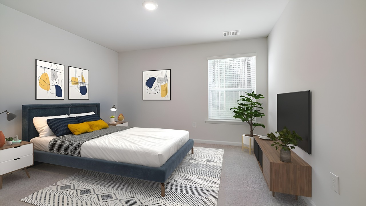 Private primary suite in the Brandon floor plan featuring a spacious bedroom, walk-in closet, and luxurious en-suite bathroom.