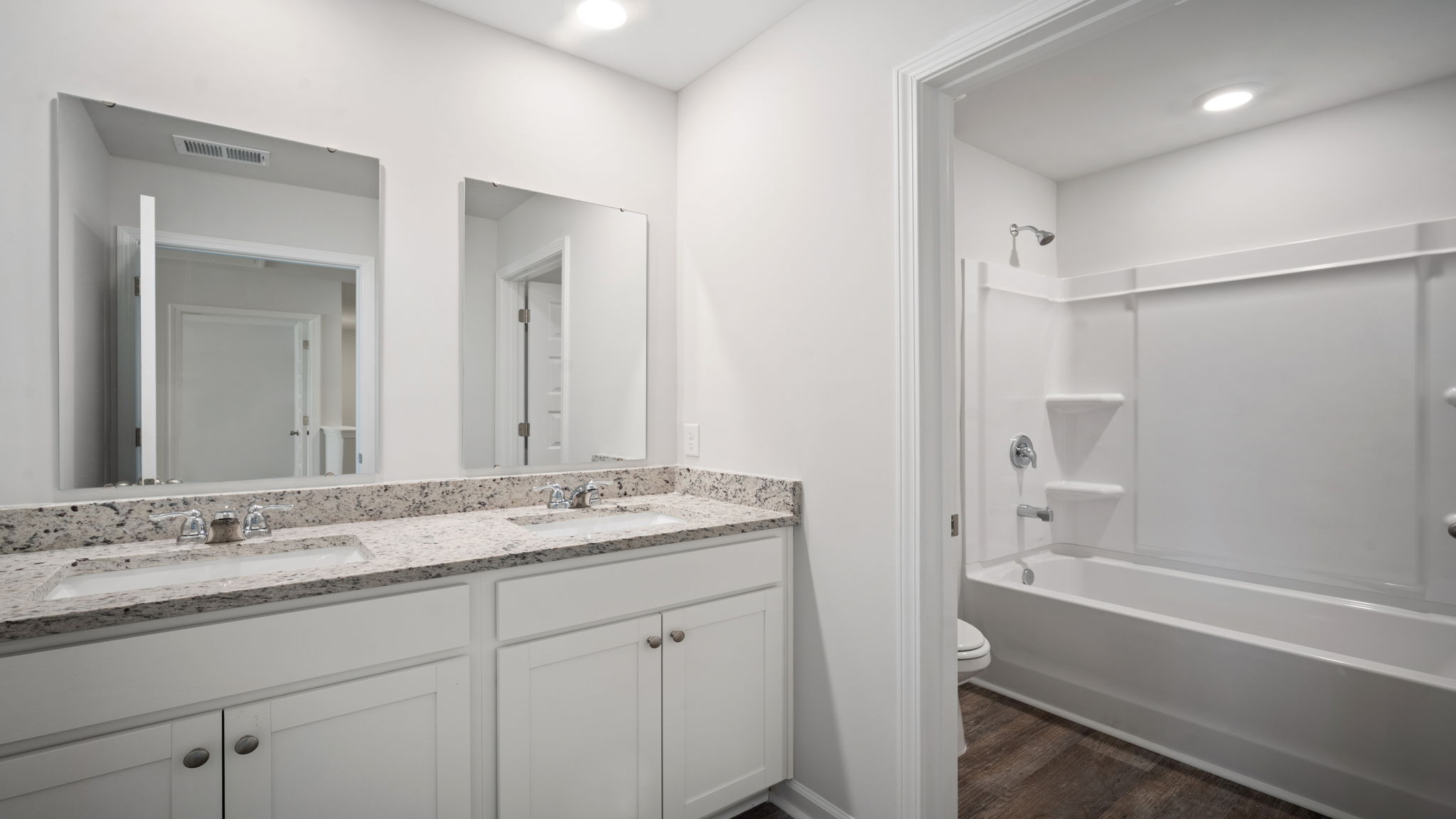 Guest bathroom with double vanities